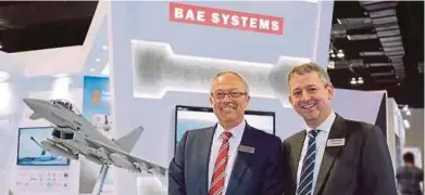  ??  ?? BAE Systems Internatio­nal sales director Andy Lavin (left) and BAE Systems Internatio­nal Ltd Southeast Asia managing director John Brosnan at the 16th Defence Services Asia 2018 in Kuala Lumpur.