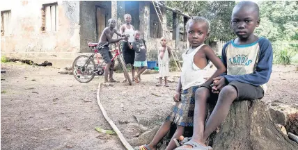  ??  ?? > Many children were made orphans by the Ebola virus outbreak in Sierra Leone following years of civil war