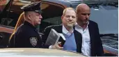  ?? — AP ?? Harvey Weinstein arrives at a police station in New York to turn himself in to authoritie­s following allegation­s of sexual misconduct on Friday.