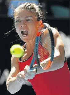  ?? /Reuters ?? Return to action: Simona Halep returns a backhand to Destanee Aiava in Melbourne on Tuesday.