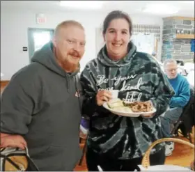  ?? SUBMITTED PHOTO ?? Matt Robinson and Kelly Schick were among those supporting Centershot, an archery program held at Salem EC Church, Lenhartsvi­lle, by attending a pork and kraut dinner over the weekend. Centershot is open to children (age 10) and adults and will begin...