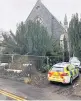  ??  ?? Search Police have kept the public out of the scene with a continuous presence at the church since Wednesday