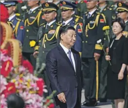  ?? Ken Ishii Pool Photo ?? UNDER President Xi Jinping, China is spending billions to mold global public opinion. U.S. officials say Beijing is advancing its agenda through coercion and lies.