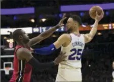  ?? CHRIS SZAGOLA — THE ASSOCIATED PRESS ?? Ben Simmons, right, and the 76ers can expect the going to be a lot tougher against the Boston Celtics in the Eastern Conference semifinals than it was versus Dwyane Wade and the Miami Heat in the opening round of the NBA playoffs.