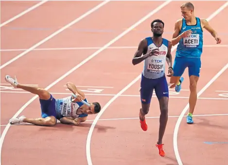  ?? Picture: Getty. ?? Team GB’s Toby Harries falls in the men’s 4x400 metres relay final.