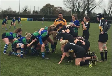  ??  ?? Scrum time during Sunday’s top of the table encounter.
