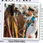  ??  ?? Prince Philip meets tribal elders in Africa