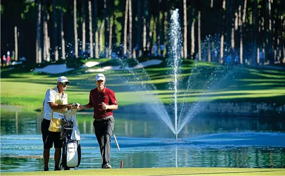  ?? STUART FRANKLIN/GETTY IMAGES ?? Justin Rose (right) with his caddie during day two of the Turkish Airlines Open at the Regnum Carya Golf Resort. Report – Page 47