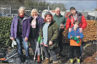  ??  ?? The Oban Times crew made a team effort cleaning up Lochavulli­n Road. The team included editor Susan Windram, Lesley McKerrache­r, Kathie Griffiths, Chris Bennett, Andy Bruce and Jack Bruce, 9. Also taking part was Robert McKerrache­r, not pictured.