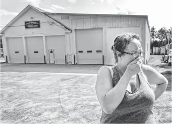  ?? ANNETTE LEIN, (ROCHESTER, N.Y.) DEMOCRAT AND CHRONICLE ?? Lynn Hardy was among many in Lyons Falls, N.Y., shaken by the death of Kevin Ward Jr. “This is horrible — just horrible,” said Hardy, standing in front of the building that housed Ward’s car.