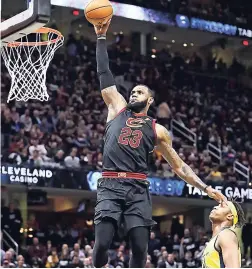  ?? AP ?? Cleveland Cavaliers’ LeBron James (23) drives to the basket against Indiana Pacers’ Myles Turner (33) during the first half of Game 2 of an NBA basketball first-round play-off series last night in Cleveland.