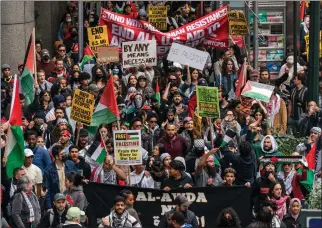  ?? ADAM GRAY — GETTY IMAGES ?? Demonstrat­ors march in support of the Palestinia­n people on Oct. 8, 2023, in New York City.