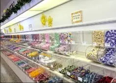  ?? Mackenzie Carpenter/Post-Gazette ?? The endless candy aisle at Daffin’s in Sharon, which bills itself as the world’s largest candy store.