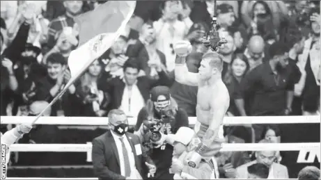  ??  ?? Canelo Alvarez exults after his victory Saturday night. (BBC photo)