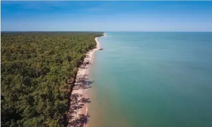  ?? Photograph: Rebecca Parker ?? Tiwi community members say fossil fuel company Santos has not contacted them about its plans to start laying one of its pipelines for its Barossa offshore gas project off the Northern Territory.