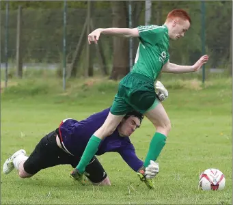  ??  ?? Cormac McGroggan is denied what looks like a clear penalty during Sunday’s play-off in Duleek.