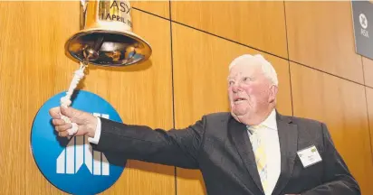  ?? BIG DAY: Henry Wagner rings the bell to launch the Toowoomba- based company on the ASX. Picture: PETER MORRIS ??