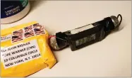  ?? AP PHOTO BY ABC NEWS ?? This image obtained Wednesday, Oct. 24, 2018, and provided by ABC News shows a package addressed to former CIA head John Brennan and an explosive device that was sent to CNN’S New York office.