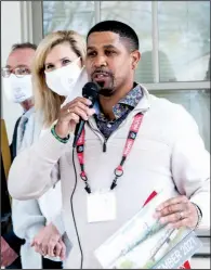  ??  ?? Chamber ambassador Andre Webster welcomes guests to the ribbon cutting ceremony at Home for Healing as Kristin Trulock and Ronnie Fehrenbach look on.