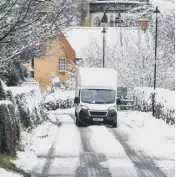  ??  ?? 0 Roslin in Midlothian was hit by snow, while England suffered with rain