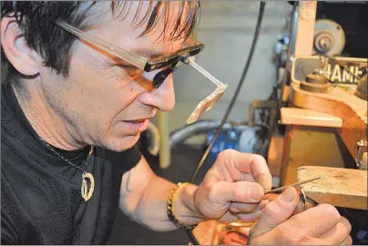  ?? CHRIS SHANNON/CAPE BRETON POST ?? Master goldsmith Rob Bowden works at restoring a diamond ring in his workshop in the women’s clothing boutique, Kreative Design, in Sydney River on Wednesday. Bowden began offering his services at Kreative Design back in April.