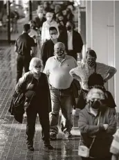  ?? Jerry Lara / Staff photograph­er ?? People receiving the vaccinatio­ns administer­ed by University Health have to preregiste­r.