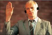  ??  ?? Polish immigrant and convicted killer Janusz Walus is sworn in during a Truth and Reconcilia­tion Commission hearing in Mamelodi, Pretoria.