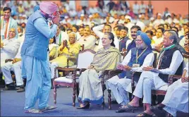  ?? PTI ?? Punjab tourism minister Navjot Singh Sidhu greets former Congress President Sonia Gandhi during the second day of the 84th Congress Plenary Session at the Indira Gandhi stadium in New Delhi on Sunday. Former Prime Minister Manmohan Singh and other...