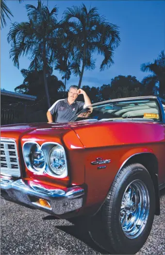  ?? Picture: ELISE DERWIN ?? Classic Holden Car Club of the NT member Mal Janes, with his 1971 HQ Statesman, is among the Territoria­ns sticking by Aussie-made cars