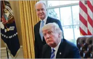  ?? AP PHOTO BY PABLO MARTINEZ MONSIVAIS ?? In this March 24, file photo, President Donald Trump with Health and Human Services Secretary Tom Price are seen in the Oval Office of the White House in Washington.