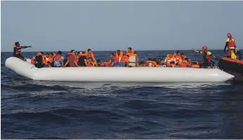  ?? AP ?? An charity group rescues migrants off the coast of Libya. The migration crisis that hit Europe in 2015 has strained resources, triggered fear of foreigners and inflamed nationalis­t tension