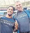  ?? CFL ?? Randy Ambrosie, right, with Chad Owens, cites the Diversity is Strength program as a league positive.