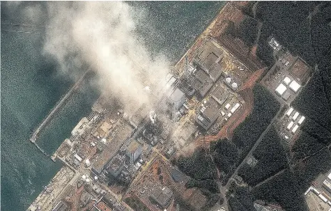  ?? AFP/GETTY IMAGES) ?? Uranium prices have fallen precipitou­sly since the 2011 Fukushima Daiichi disaster, above, led to the shutdown of every nuclear reactor in Japan. But with 60 new reactors under constructi­on around the world, demand may recover, Cameco’s CEO says.