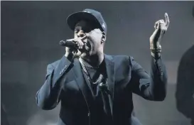  ??  ?? In this Nov. 4 file photo, Jay Z performs during a campaign rally for Democratic presidenti­al candidate Hillary Clinton in Cleveland.
[AP PHOTO]