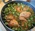  ?? ?? Noha Nasef, left, prefers a light meal to break her daily fast. Aliya Danzeisen, above, and her okra stew that’s a staple of West African cuisine.
Below: Injera is a spongy pancake used to scoop food from your plate.