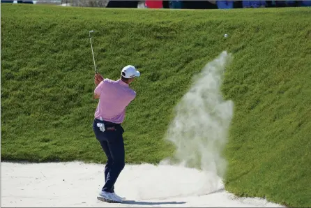  ?? The Associated Press ?? Brett Walker hits from the sand on No. 14 during the first round of the PGA Championsh­ip golf tournament on the Ocean Course, Thursday, in Kiawah Island, S.C.