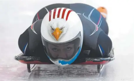  ?? Matthias Hangst, Getty Images ?? Team USA skeleton slider Katie Uhlaender of Breckenrid­ge tunes up Wednesday for her Olympic competitio­n at the PyeongChan­g Games in South Korea.