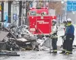  ?? Picture: AP ?? Firefighte­rs work at the scene of an explosion in Sapporo, Japan.