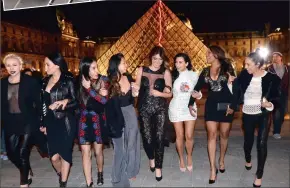  ??  ?? eYeful: Bride-to-be Kim Kardashian and friends outside the Louvre in Paris, where the reality star’s hen party also took in the Eiffel Tower