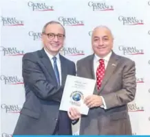  ??  ?? George Richani receives the award from a Best Bank in Kuwait 2017. Global Finance as
