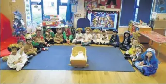  ??  ?? St Oswald’s RC Primary and Nursery children performed Wriggly Nativity