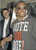  ?? ?? HE DID’ IT: Rob Shuter, pictured in the background, worked with Diddy during the star’s 2004 “Vote or Die” campaign.