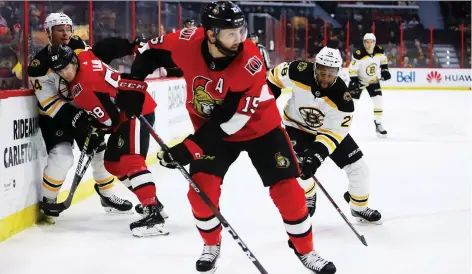  ?? FRED CHARTRaND/THE CANADIAN PRESS ?? Senators left-winger Zack Smith said he has enjoyed his role as a shutdown player, especially after being placed on waivers by the club earlier this season. He played a key role Sunday in Ottawa’s 2-1 overtime win over Boston at Canadian Tire Centre.