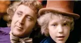 ??  ?? Film version: Gene Wilder as Willy Wonka and Peter Ostrum as Charlie