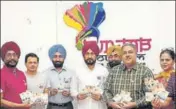  ?? HT PHOTO ?? Tourism and cultural affairs minister Charanjit Singh Channi (centre) launching the badge of logo for the 550th birth anniversar­y of Guru Nanak on Saturday.