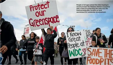  ??  ?? People of all ages joined the hikoi hoping it would prompt the Waikato District Council to take a lead on protecting the ma¯ra kai, the food growing pits, located on land earmarked for residentia­l developmen­t.