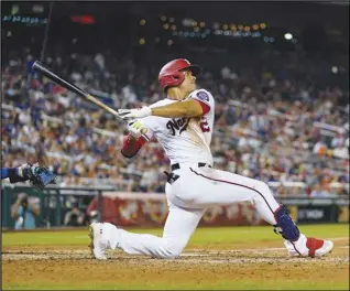  ?? Associated Press ?? The Washington Nationals’ Juan Soto bats during a game against the New York Mets, Monday, at Nationals Park in Washington. The Padres won the Soto sweepstake­s, acquiring the 23-year-old and first baseman Josh Bell from Washington for rookie lefthander Mackenzie Gore, first baseman/DH Luke Voit and four prospects.