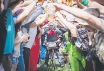  ??  ?? The 2014 Tour de Fat in Fort Collins attracted 25,000 bike and beer lovers. The free event visits Denver on Aug. 26. Provided by New Belgium Brewing