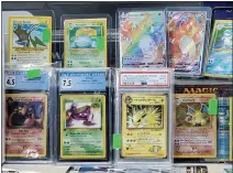  ?? ANDREW KULP — READING EAGLE ?? Individual Pokemon cards like these can go for hundreds, even thousands of dollars at collectibl­e shops or on online resale markets.