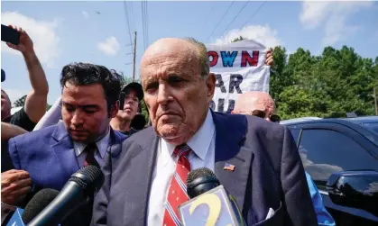  ?? Brynn Anderson/AP ?? Rudy Giuliani outside the Fulton county jail in Atlanta last week. The former New York mayor faces 13 counts in Georgia. Photograph: